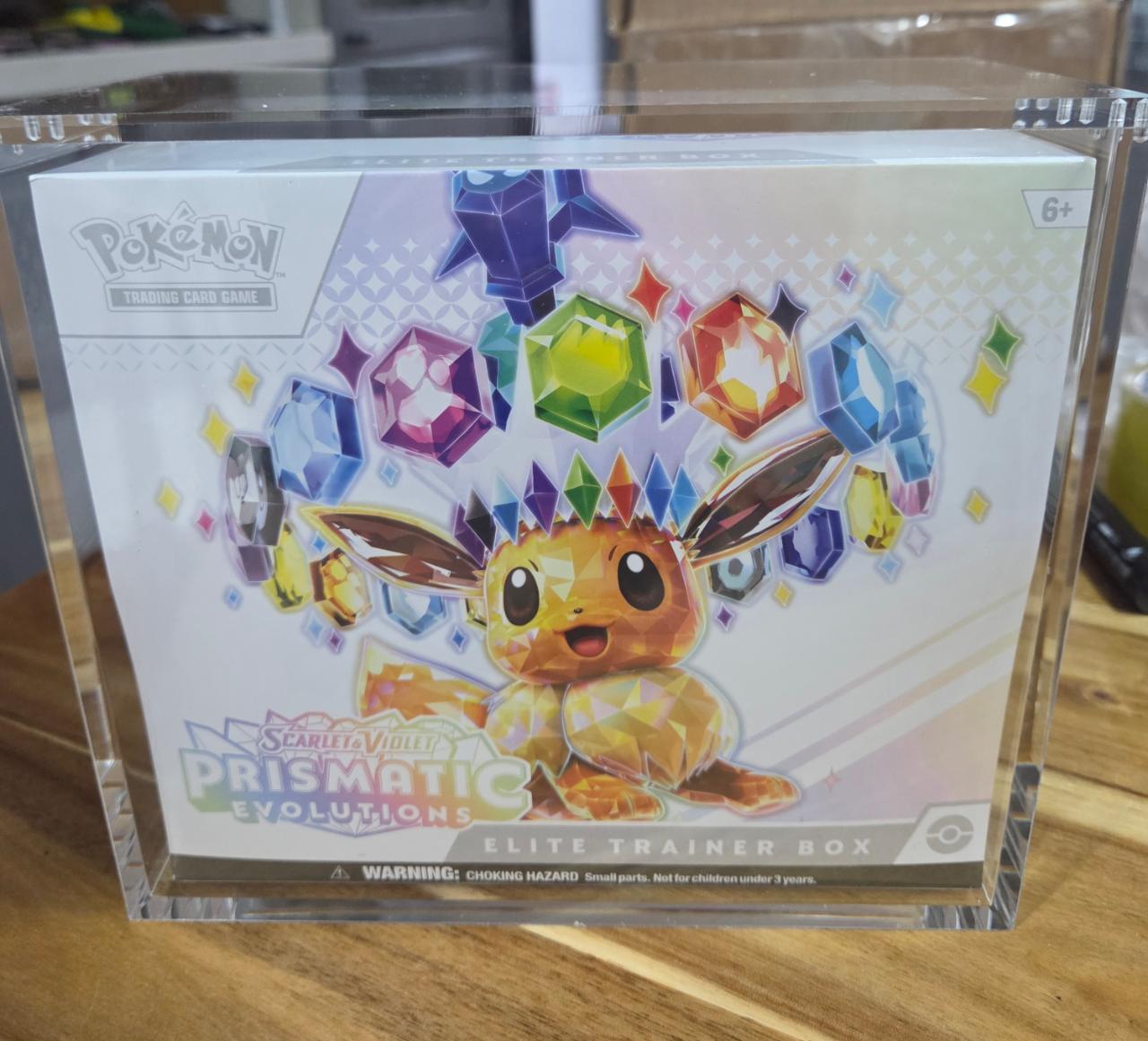 포켓몬 TCG 프리즈메틱 에볼루션 엘리트 트레이너 박스 사진 1